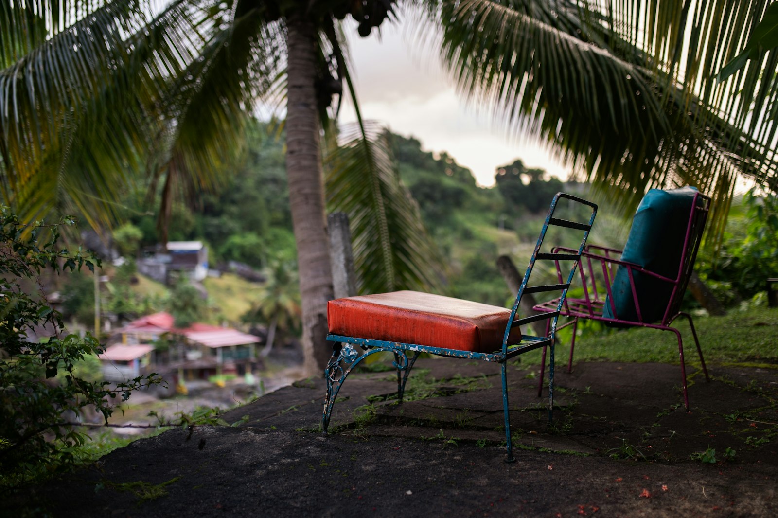 a couple of chairs sit near each other